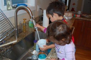 Evan and Sophie do the dishes