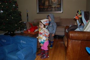Evan and Sophie reay to go outside on a rainy December day. 