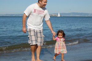 Sophie and Daddy on the beach