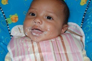 Max's first meal of rice cereal at 4 months