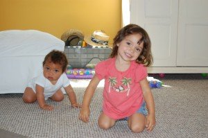 Proud big sister poses with Max