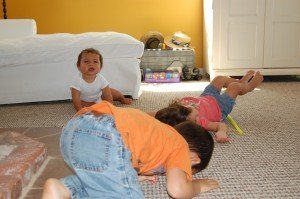 Having "mastered" crawling a few minutes earlier, Sophie and Evan decide that Max should learn how to somersault as well!
